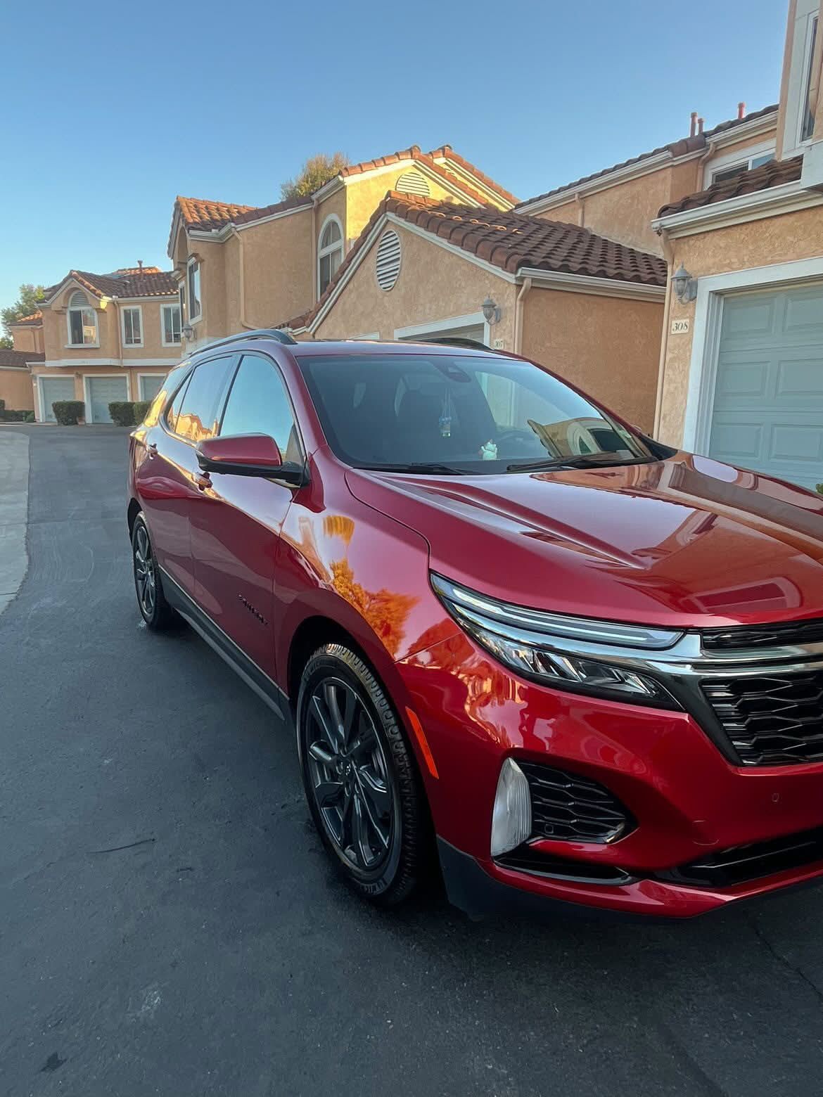 Freshly detailed red vehicle exterior